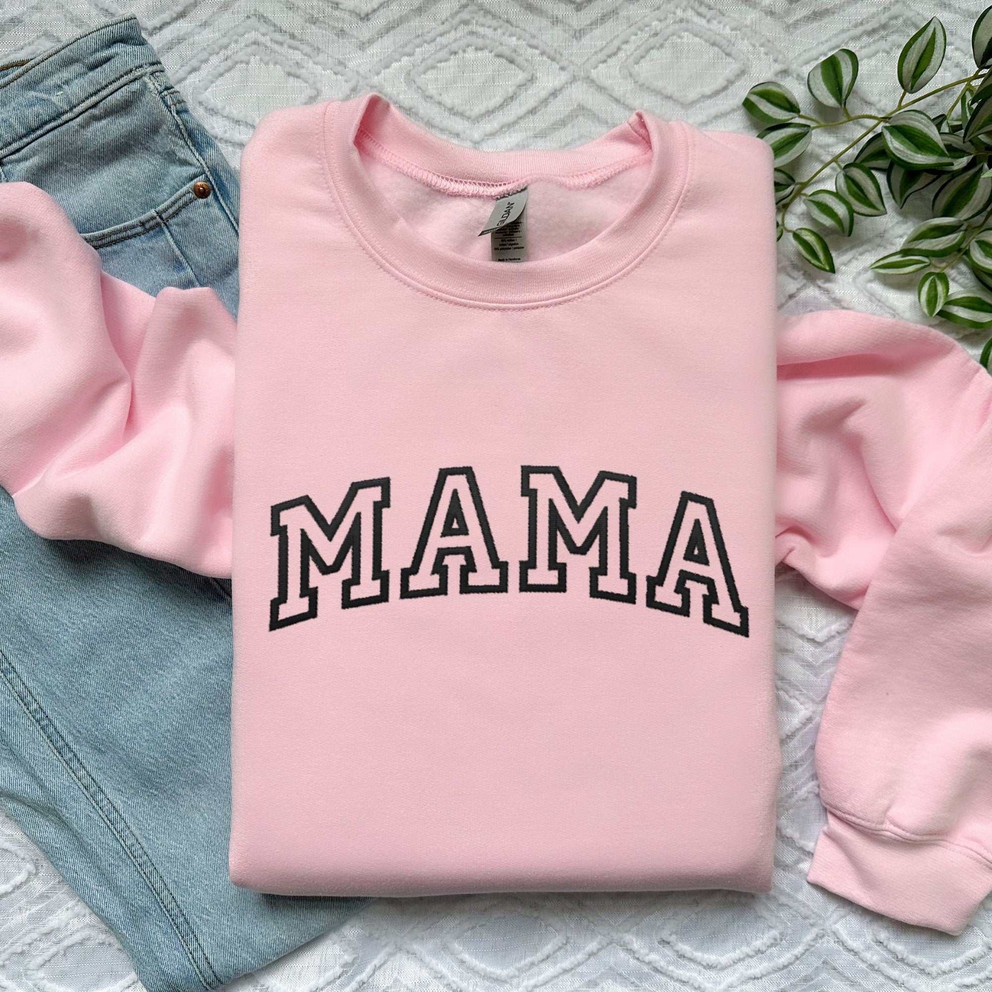 Custom embroidered "Dog Mama" sweatshirt for moms, pink crewneck design.