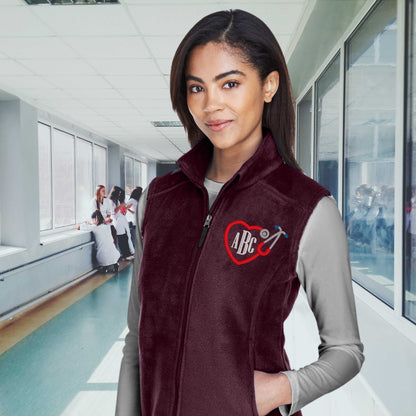 Custom RN embroidered fleece vest, personalized nurse gift, unisex sizing, cozy healthcare professional apparel.