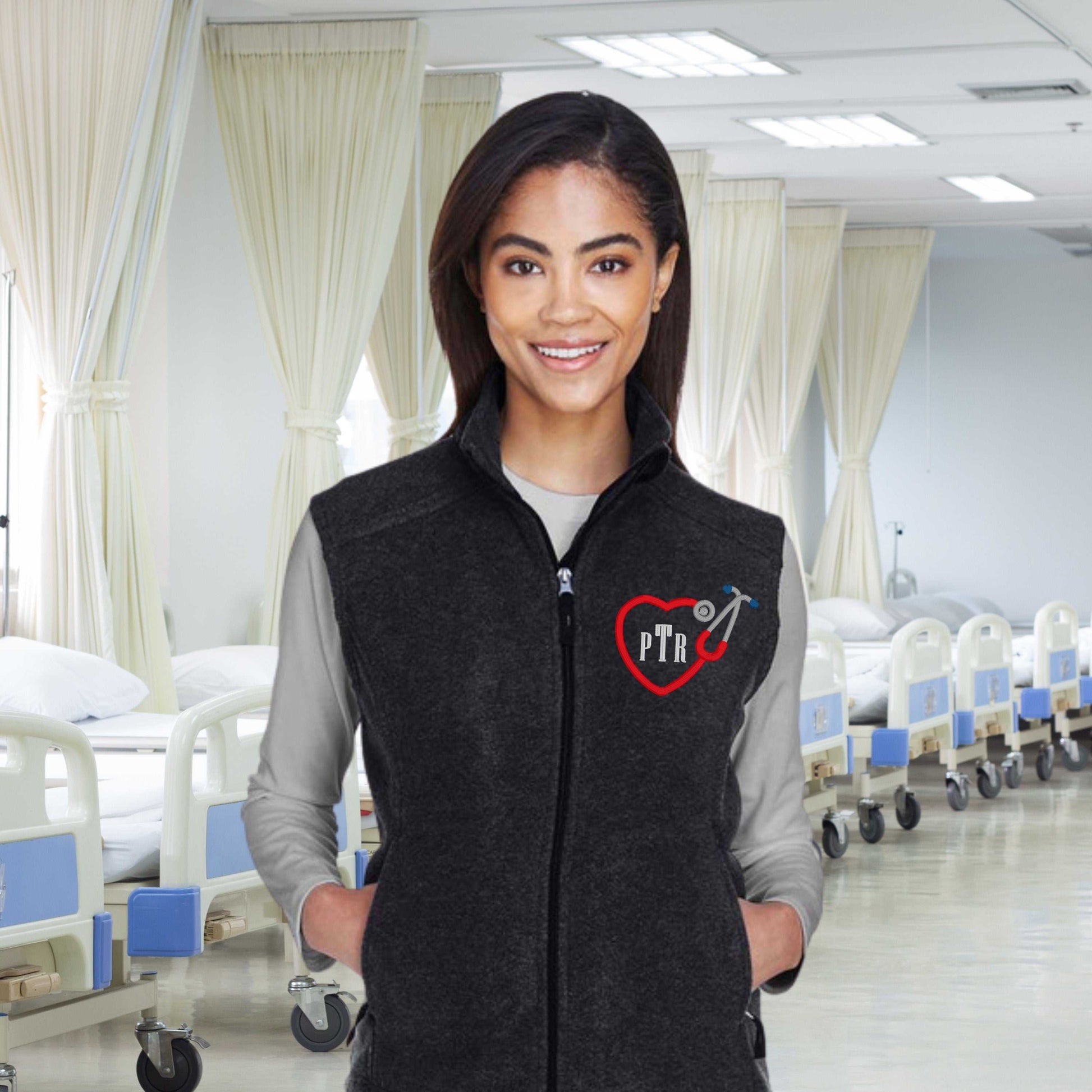 Custom RN embroidered fleece vest with heart logo, personalized nurse gift, unisex sizing.