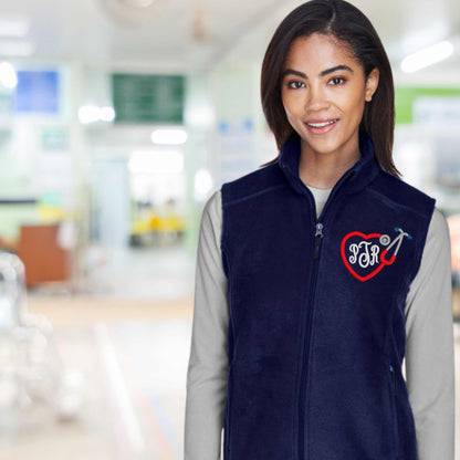 Custom RN embroidered fleece vest personalized for nurses; ideal gift for nurse graduation.