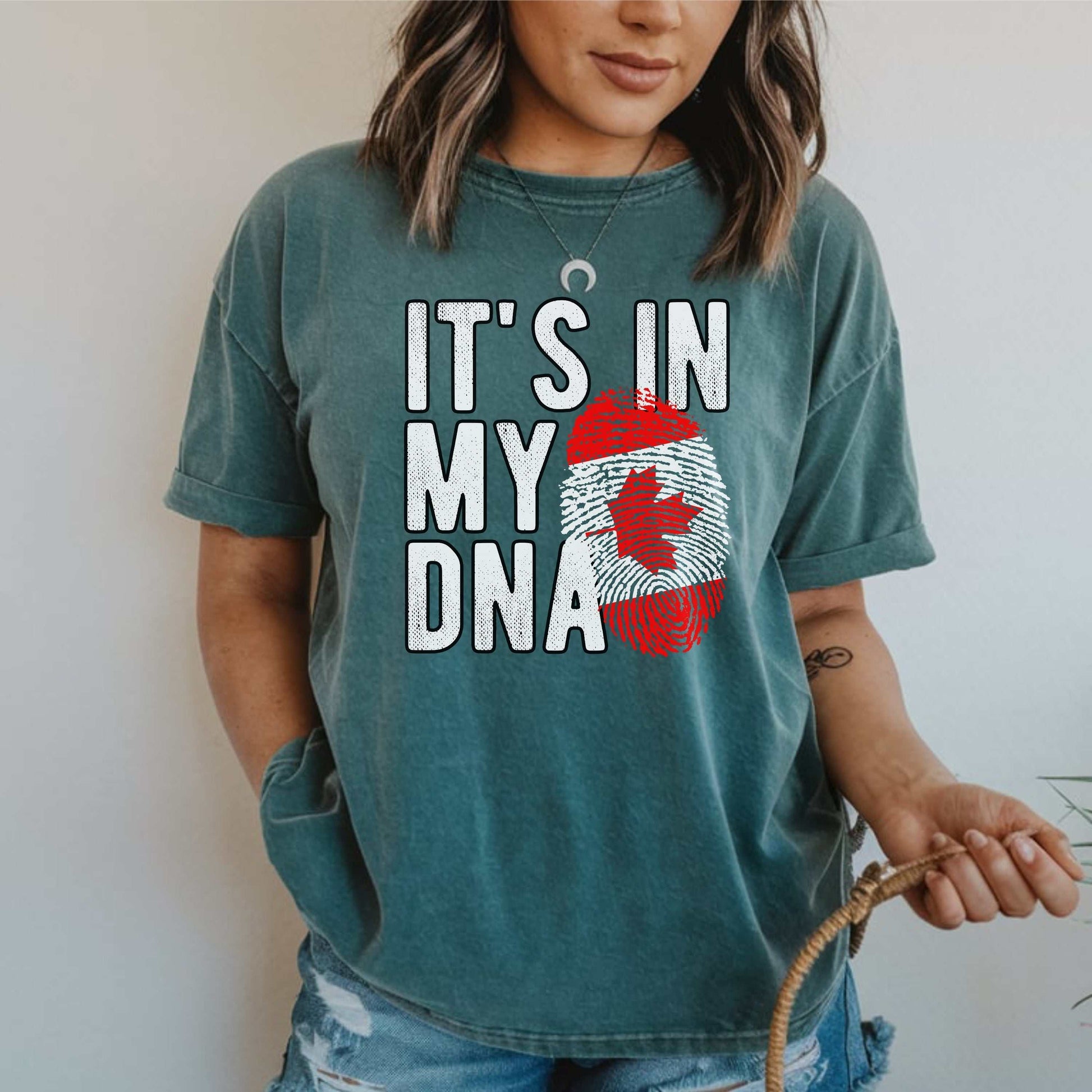 Canadian pride t-shirt with fingerprint and maple leaf design; perfect for Canada Day.