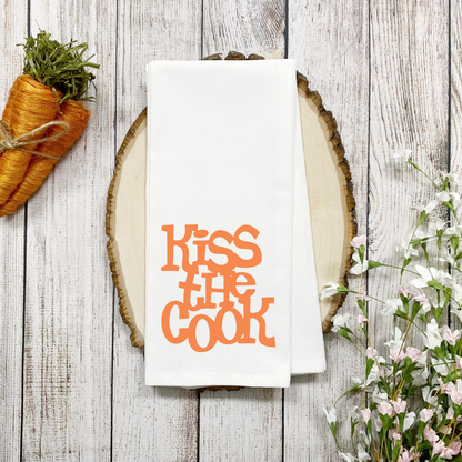 Humorous Tea Towel Kiss the Cook with colorful design, perfect kitchen gift and decor accessory