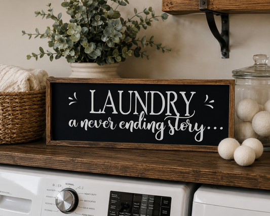 Laundry sign with decorative elements on a shelf in a laundry room.