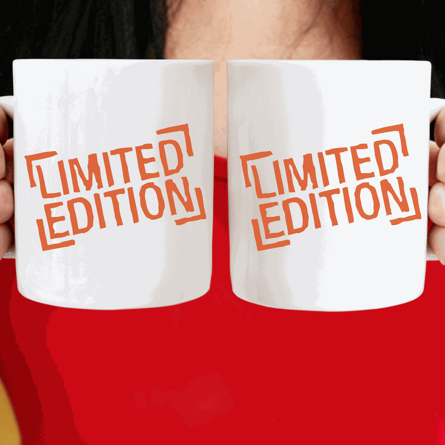 Limited edition ceramic mugs with "Limited Edition" design in orange text.