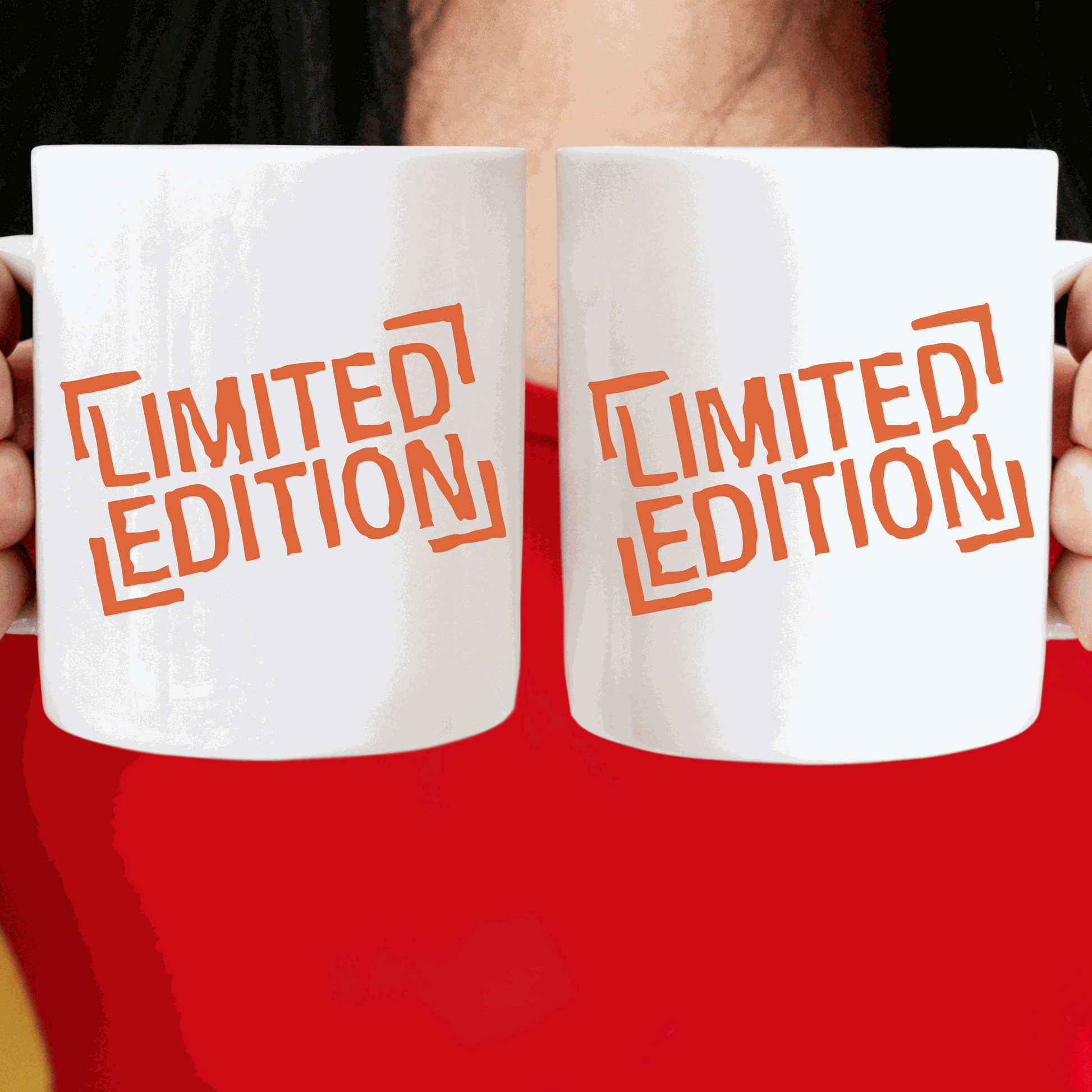 Limited edition ceramic mugs with "Limited Edition" design in orange text.