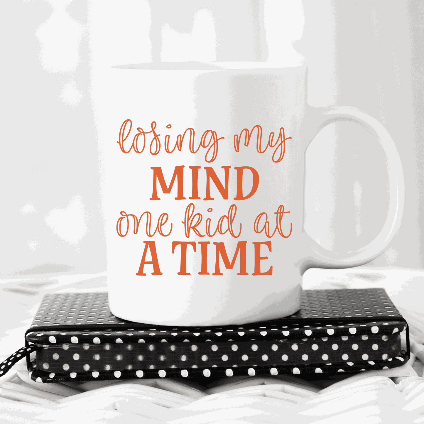 "Losing my Mind one Kid at a Time" ceramic mug, humorous gift for moms, 15 oz, white glossy finish.