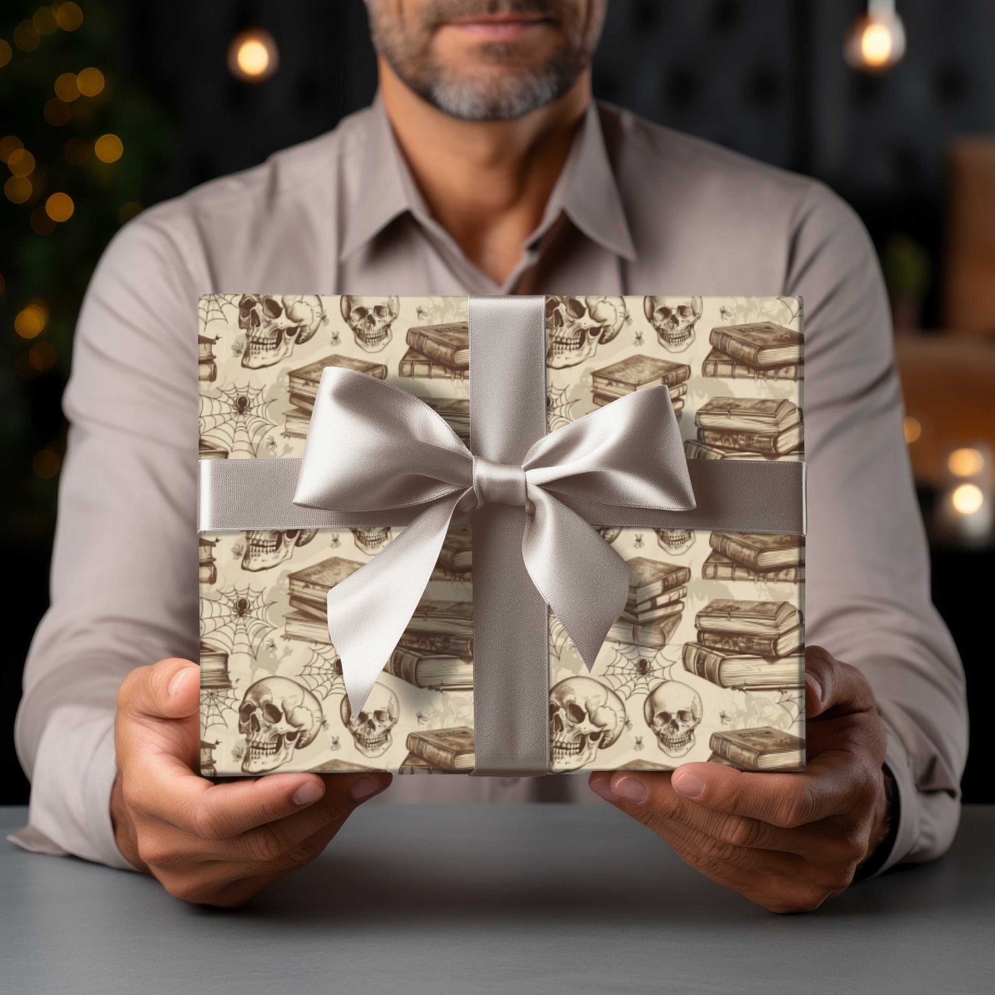 Gothic Halloween wrapping paper with skull and book design, perfect for spooky library-themed gifts.