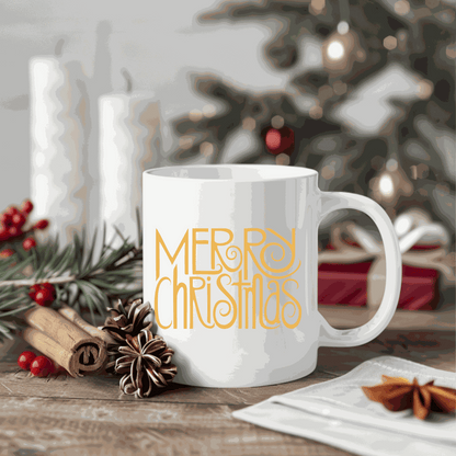 White ceramic mug with "Merry Christmas" design, surrounded by festive holiday decor.
