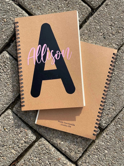 Personalized soft cover spiral notebooks with printed initials and name, kraft cover, 8 x 5.5 inches.