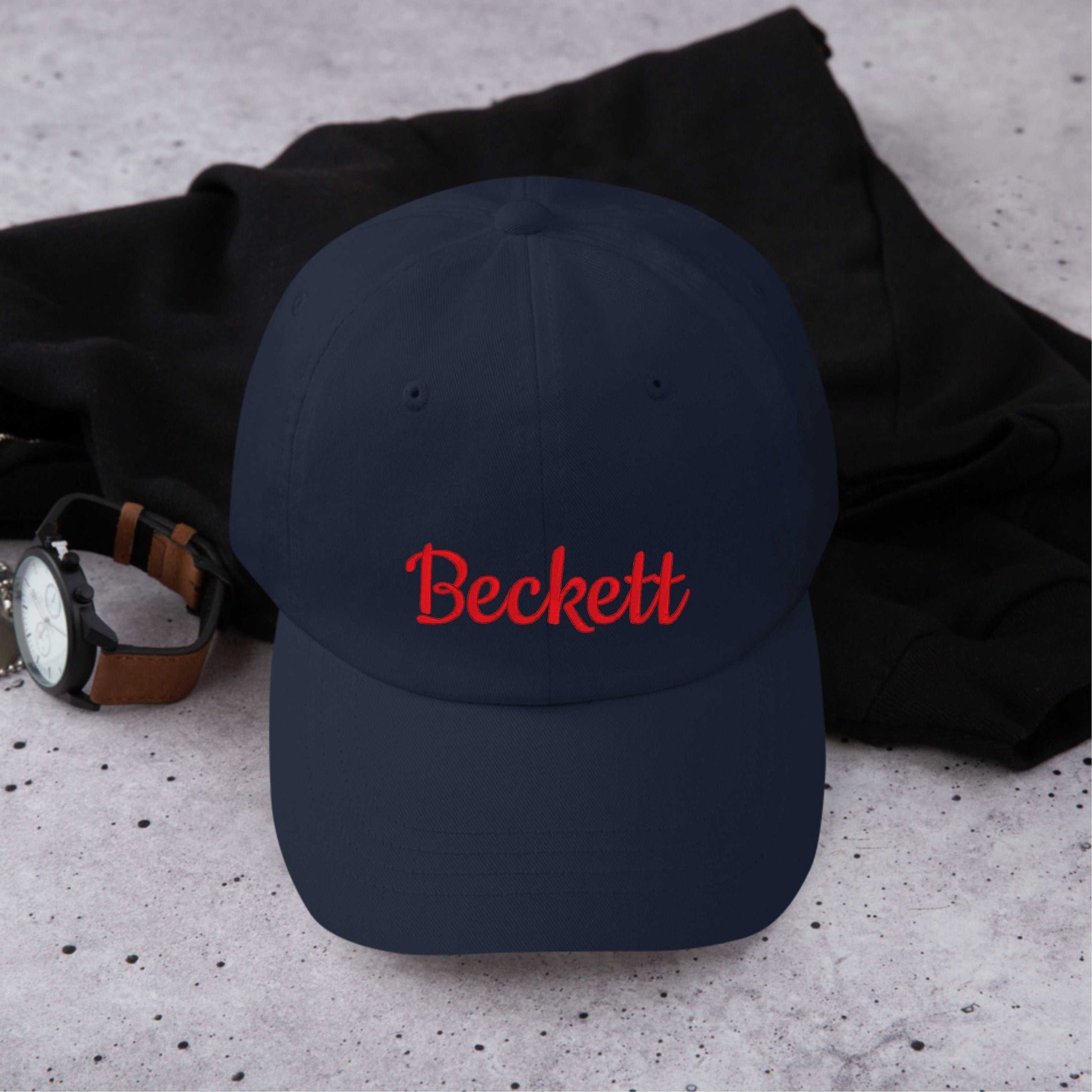 Custom embroidered navy blue personalized cap with red text Beckett, unisex cotton dad hat with adjustable snapback.