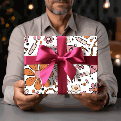 nurse themed gift wrapping paper with pink bow