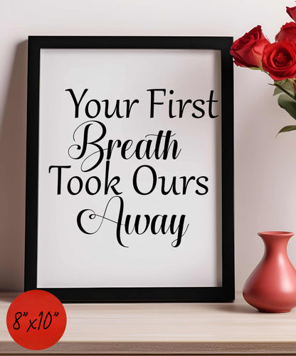 Wood framed sign with "Your First Breath Took Ours Away" quote in black on white background, nursery décor gift