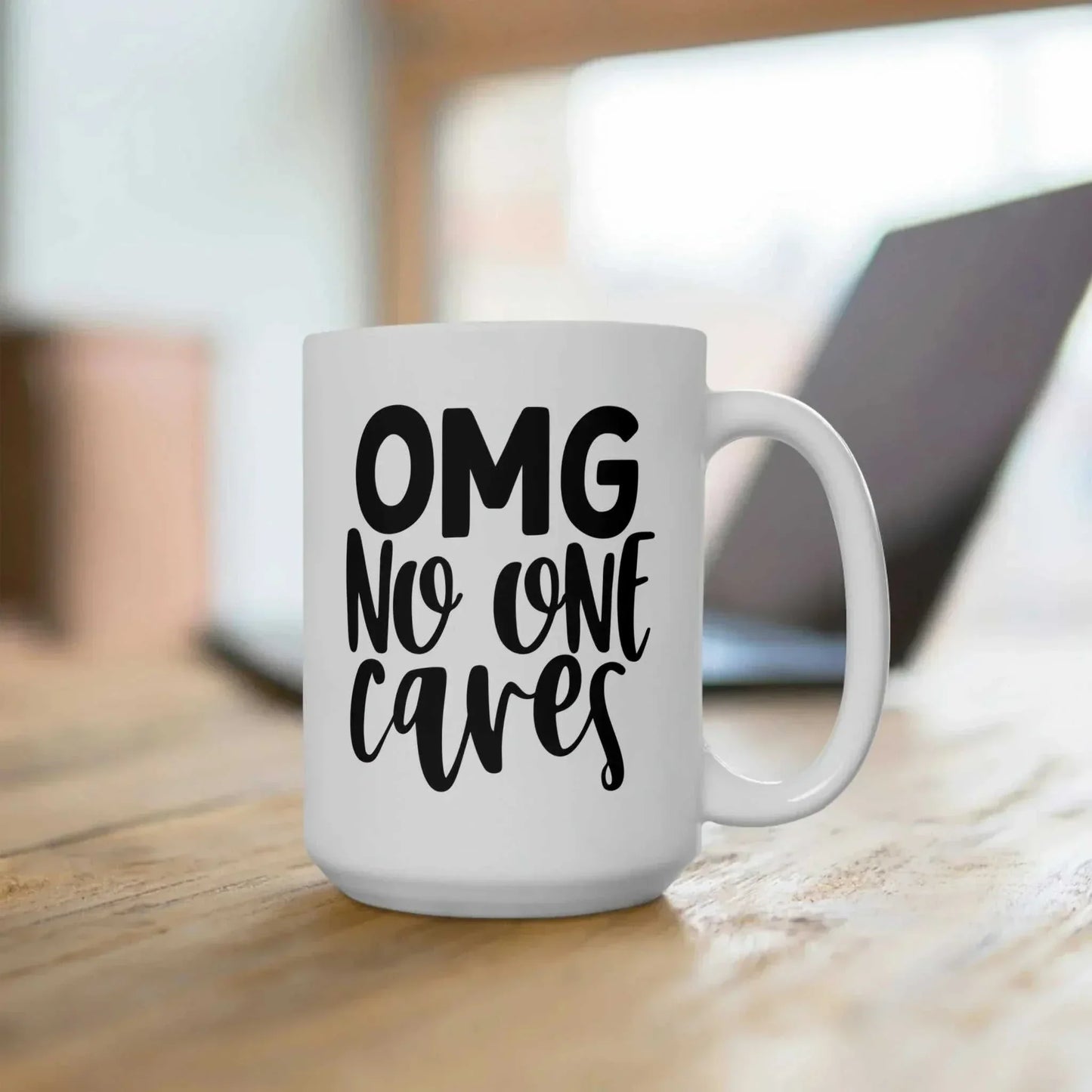 White ceramic coffee mug with black "OMG No One Cares" text, sarcastic and humorous design for office or home use