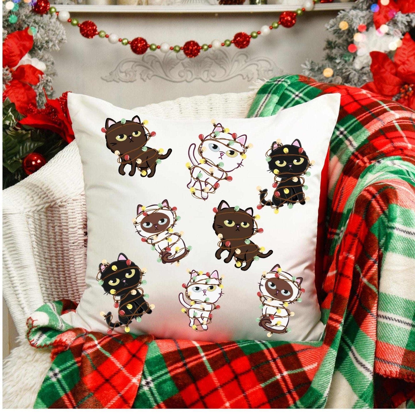 Christmas cat pillowcase with cute kittens in lights on a chair with festive decor.