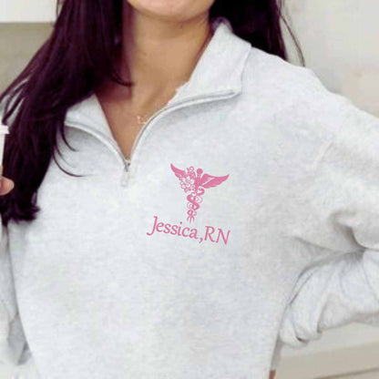 Nurse embroidered quarter zip sweatshirt with custom name and medical symbol