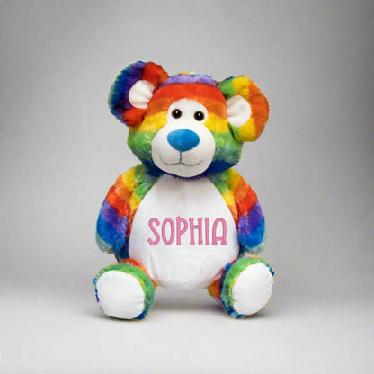 Personalized rainbow teddy bear with embroidered name for baby memorial keepsake.