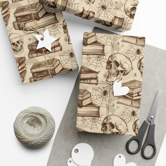 Gothic wrapping paper with skull, books, and spider web design for Halloween gifts.