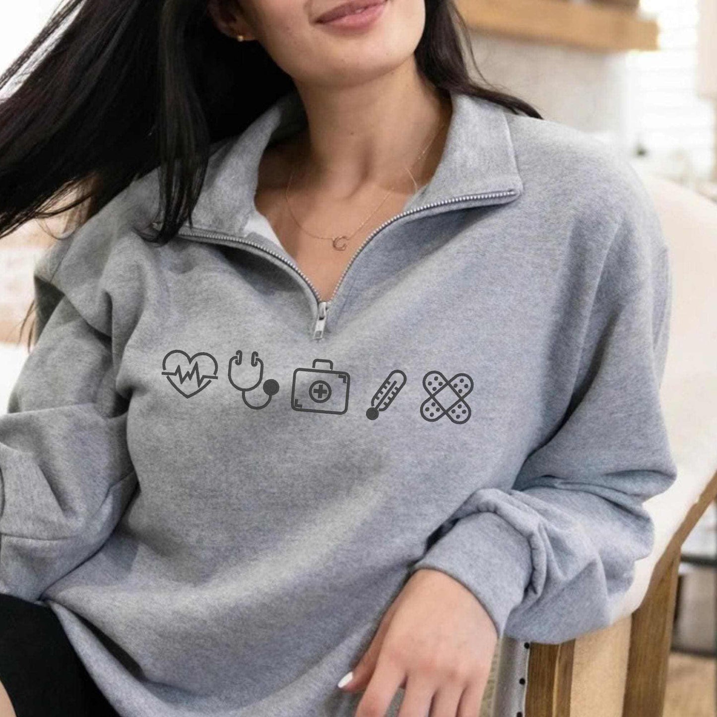 Embroidered Varsity Nurse Icon Quarter Zip Sweatshirt