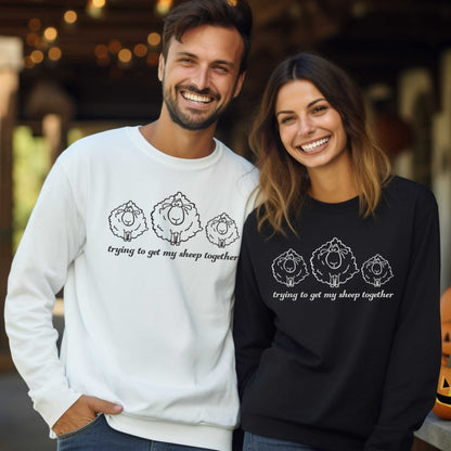 Cozy embroidered sweatshirt with three fluffy sheep and humorous text, available in black, white, or grey.