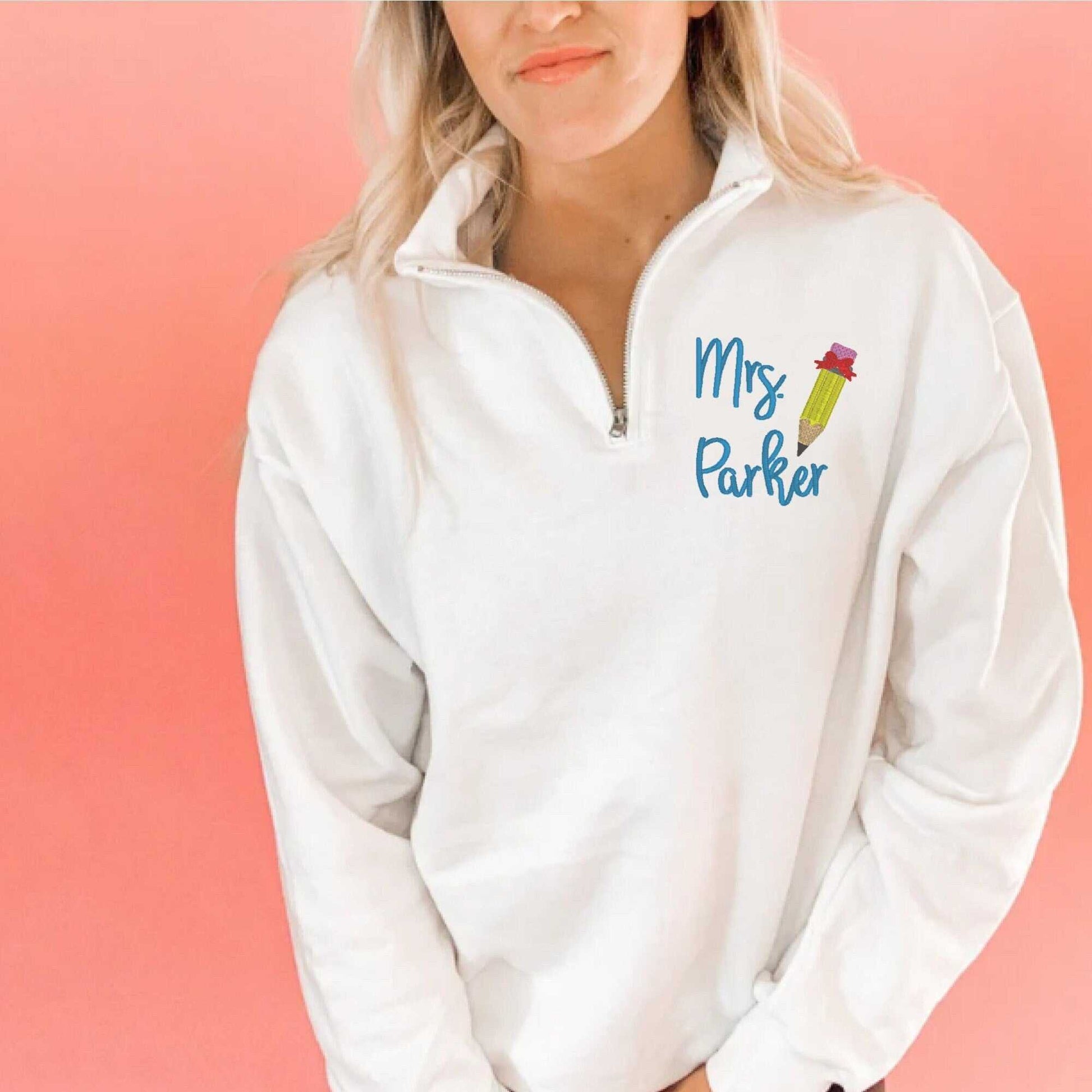 Personalized teacher quarter zip sweatshirt with embroidered name and pencil design
