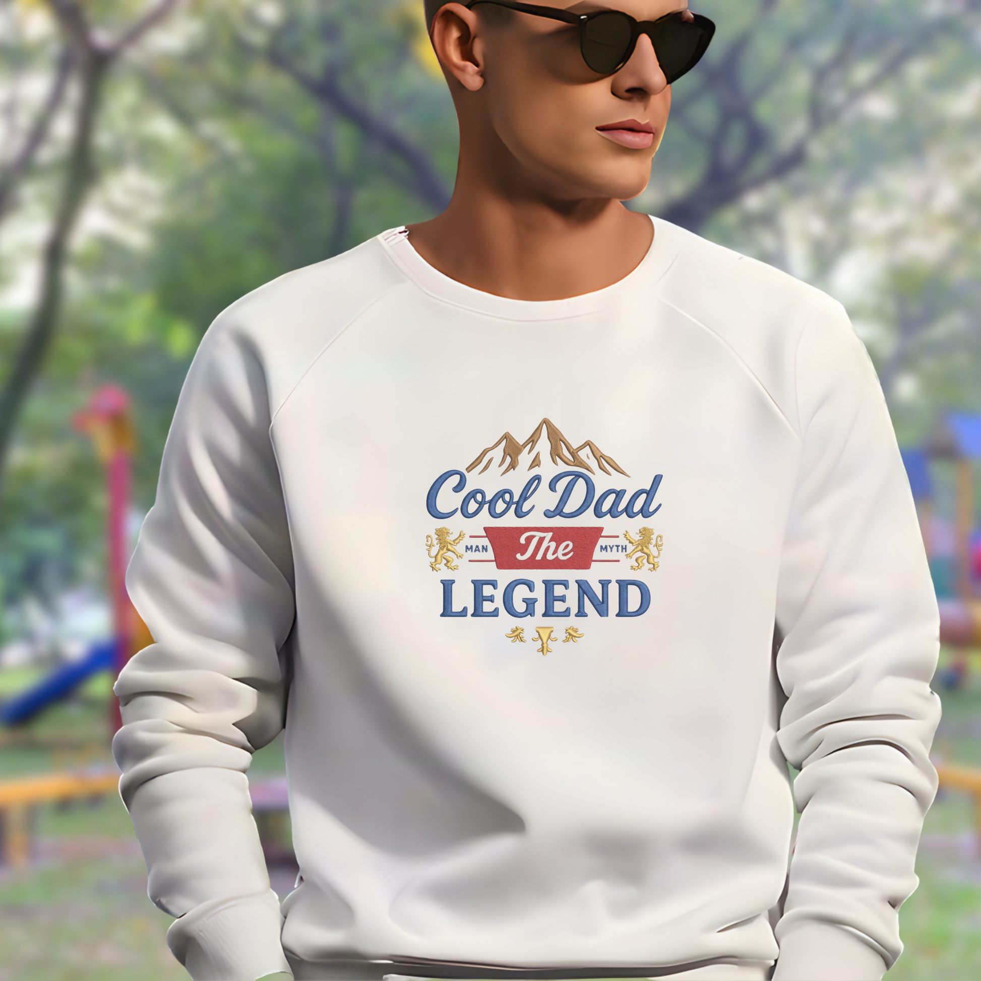 Person wearing a white sweatshirt with 'Cool Dad The Legend' text in an outdoor setting