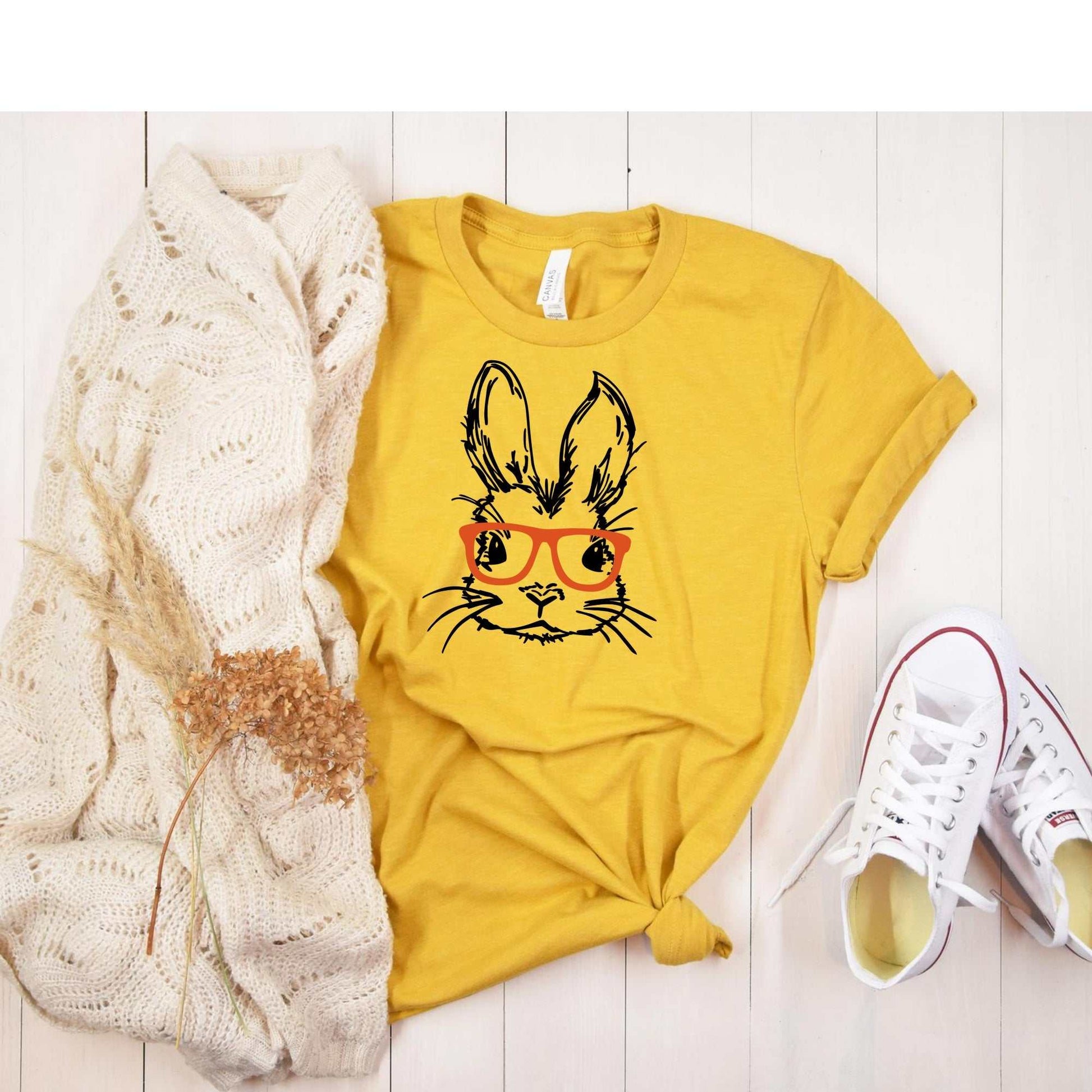 Cute Easter bunny with glasses graphic tee in yellow, ideal unisex gift for spring.