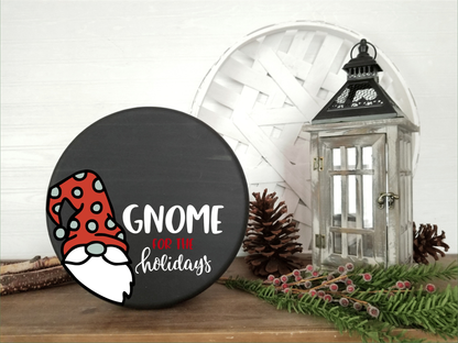 Gnome for the Holidays wood round, shelf sitter with black background and festive design.