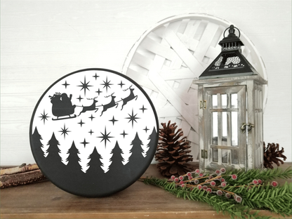 Handmade wood sign featuring Santa and sleigh silhouette, rustic holiday decor.