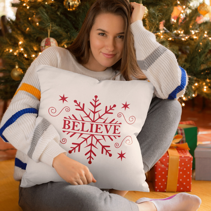 Christmas snowflake pillow cover with "Believe" text, festive home decor.