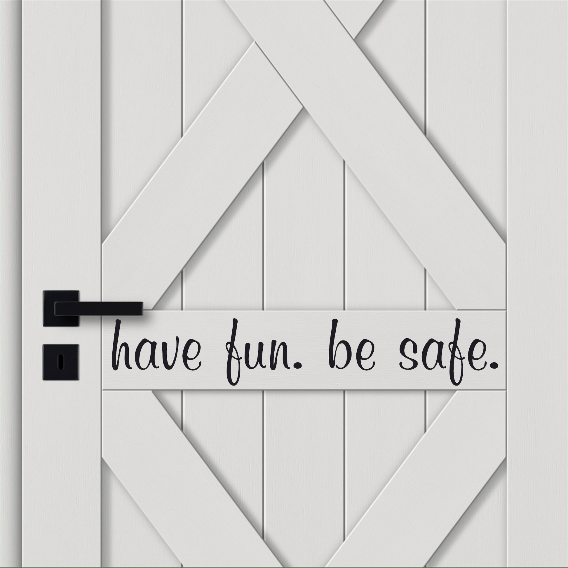 Vinyl door decal with "have fun. be safe." message in black font on a white door.