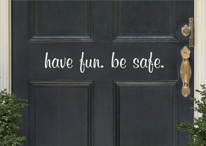Have Fun Be Safe vinyl door decal on black door.