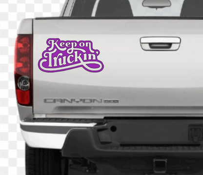 Keep On Truckin Sticker on a vehicle, purple vinyl decal suitable for windows and smooth surfaces.