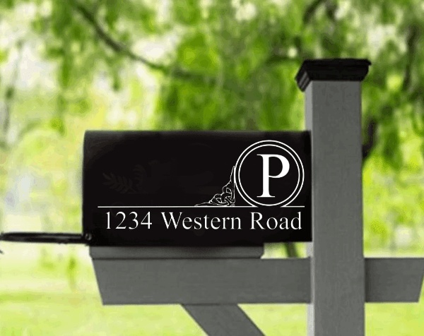 Personalized mailbox house number address decal with custom initial on a black mailbox.