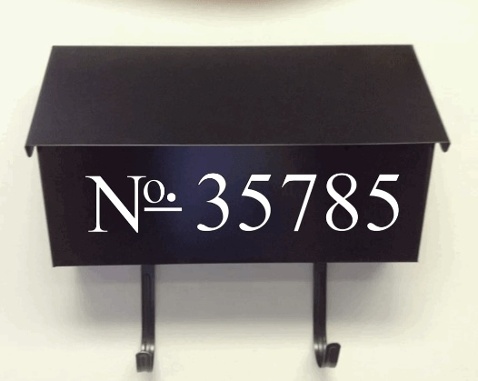 Black mailbox with customized white vinyl decal displaying house number 35785.