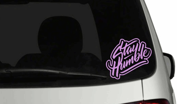 Personalized "Stay Humble" car decal in gloss finish vinyl on rear window.