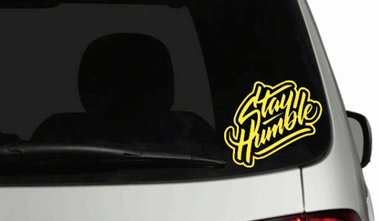 Stay Humble yellow personalized car decal on rear window.