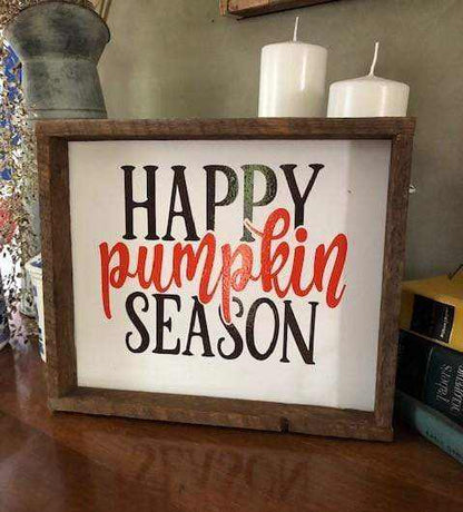 Handcrafted wood sign with "Happy Pumpkin Season" in black and orange lettering, framed with stained wood, ideal for fall decor.