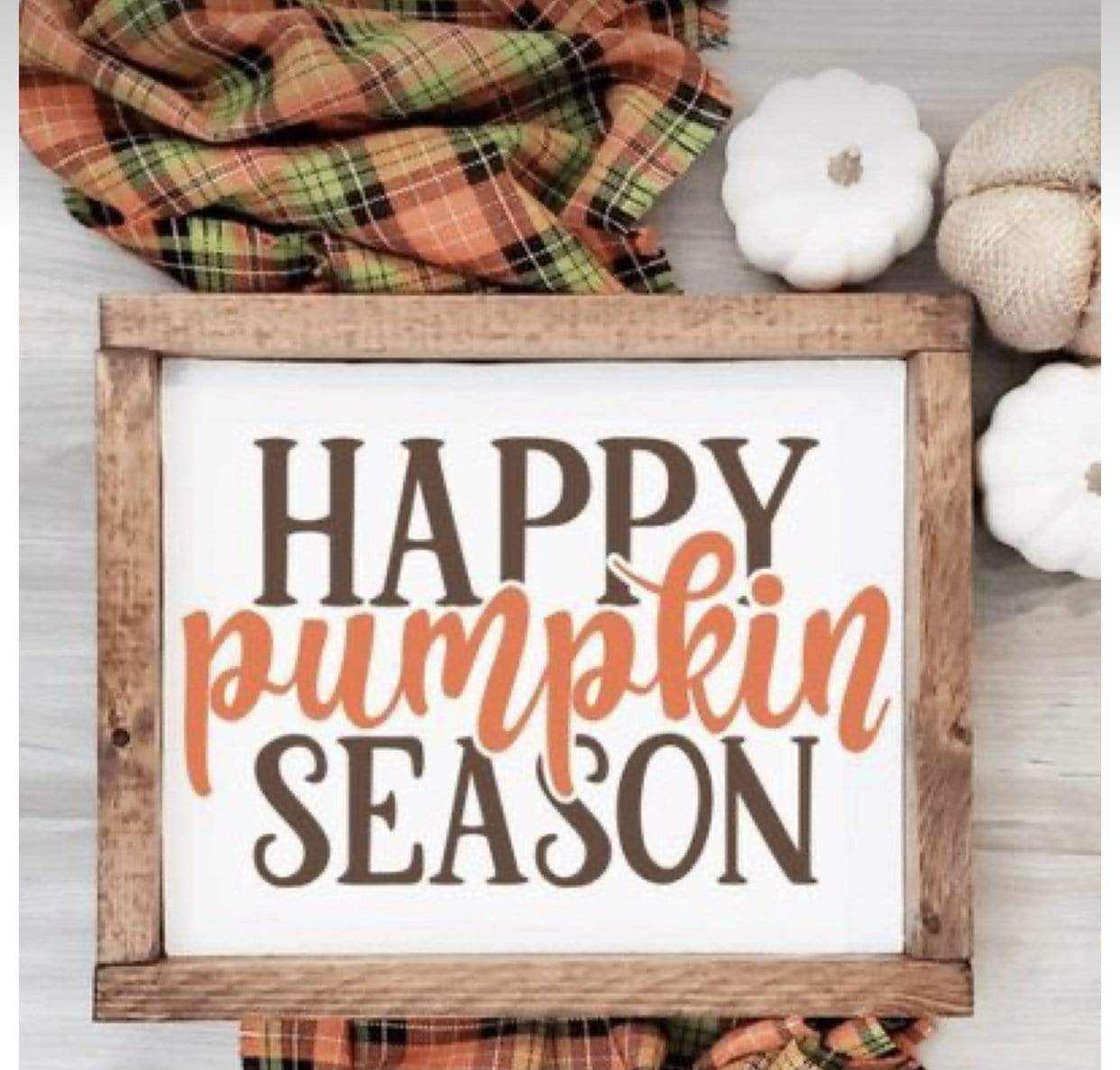 Handcrafted wood sign with "Happy Pumpkin Season" text in black and orange, framed with stained wood.