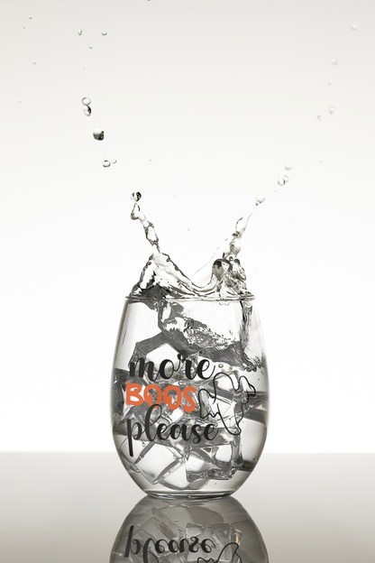 Halloween-themed stemless wine glass with "More Boos Please" design.