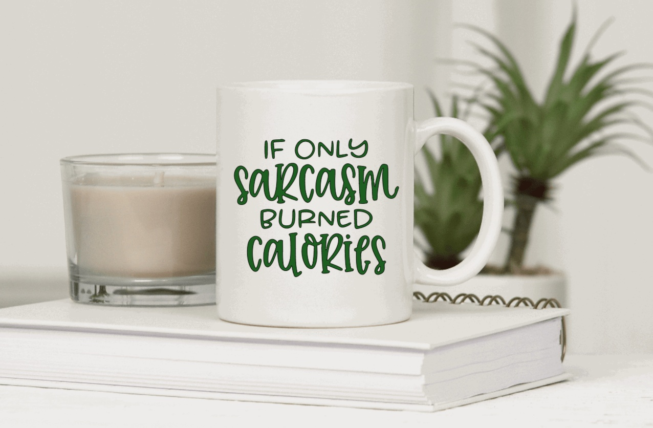 Ceramic mug with "If only sarcasm burned calories" text.