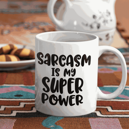 Humorous white ceramic mug with "Sarcasm is my Super Power" text, 11 oz capacity.