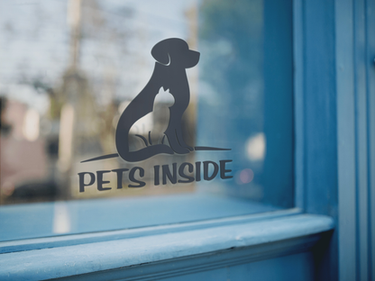 Pet emergency window decal indicating pets inside for first responders on a glass surface.