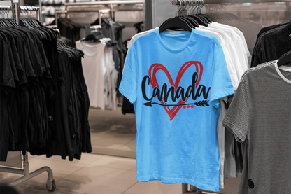Blue Canadian T-shirt with red heart design displayed in a store.