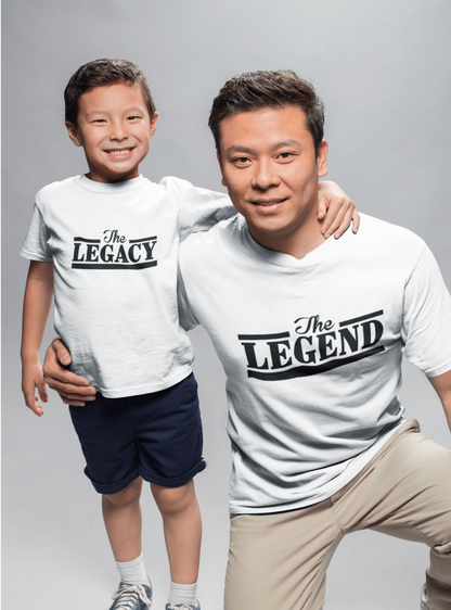 Father and son wearing matching white "The Legend" and "The Legacy" t-shirts celebrating their bond