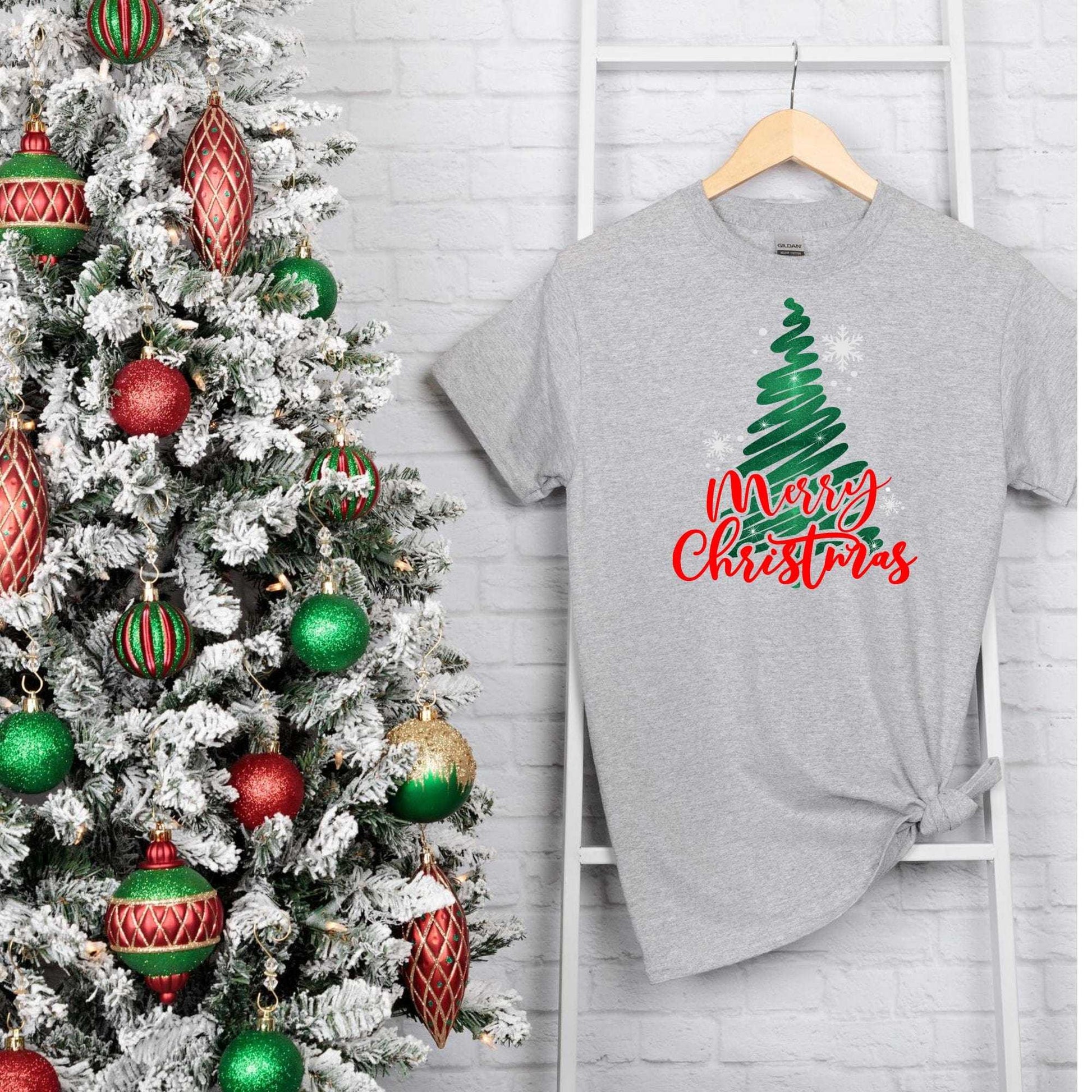 Merry Christmas Glitter Tree Shirt displayed next to a decorated Christmas tree.