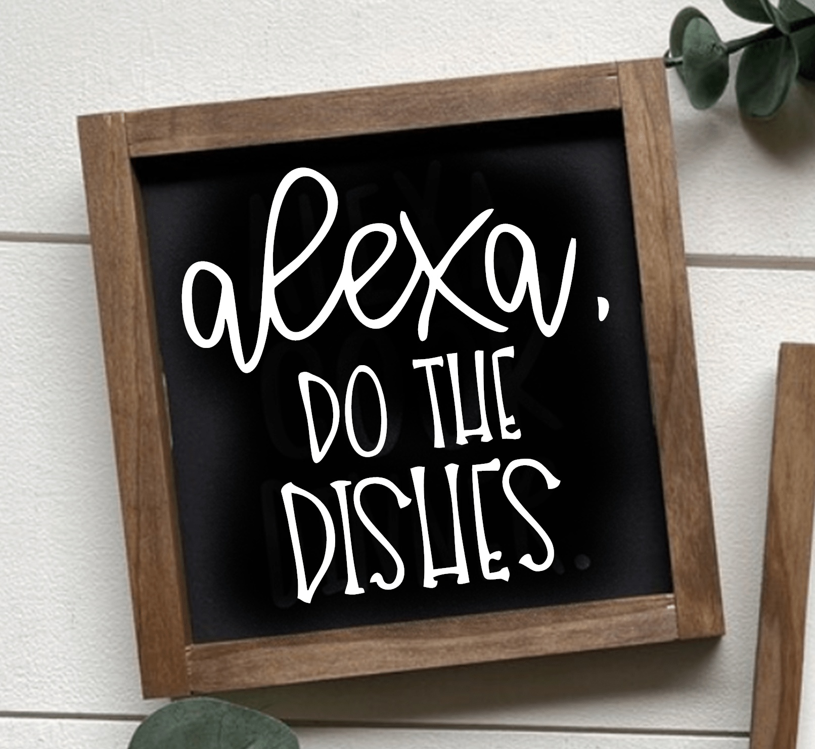 Handcrafted framed wood sign with "Alexa, Do The Dishes" on a black background with white lettering.