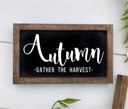 Handcrafted wood sign with "Autumn Gather the Harvest" message, featuring rustic distressed finish and customizable options.