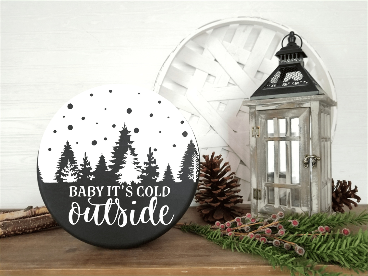 Handmade "Baby It's Cold Outside" wood sign with pine tree design, perfect for holiday decor.