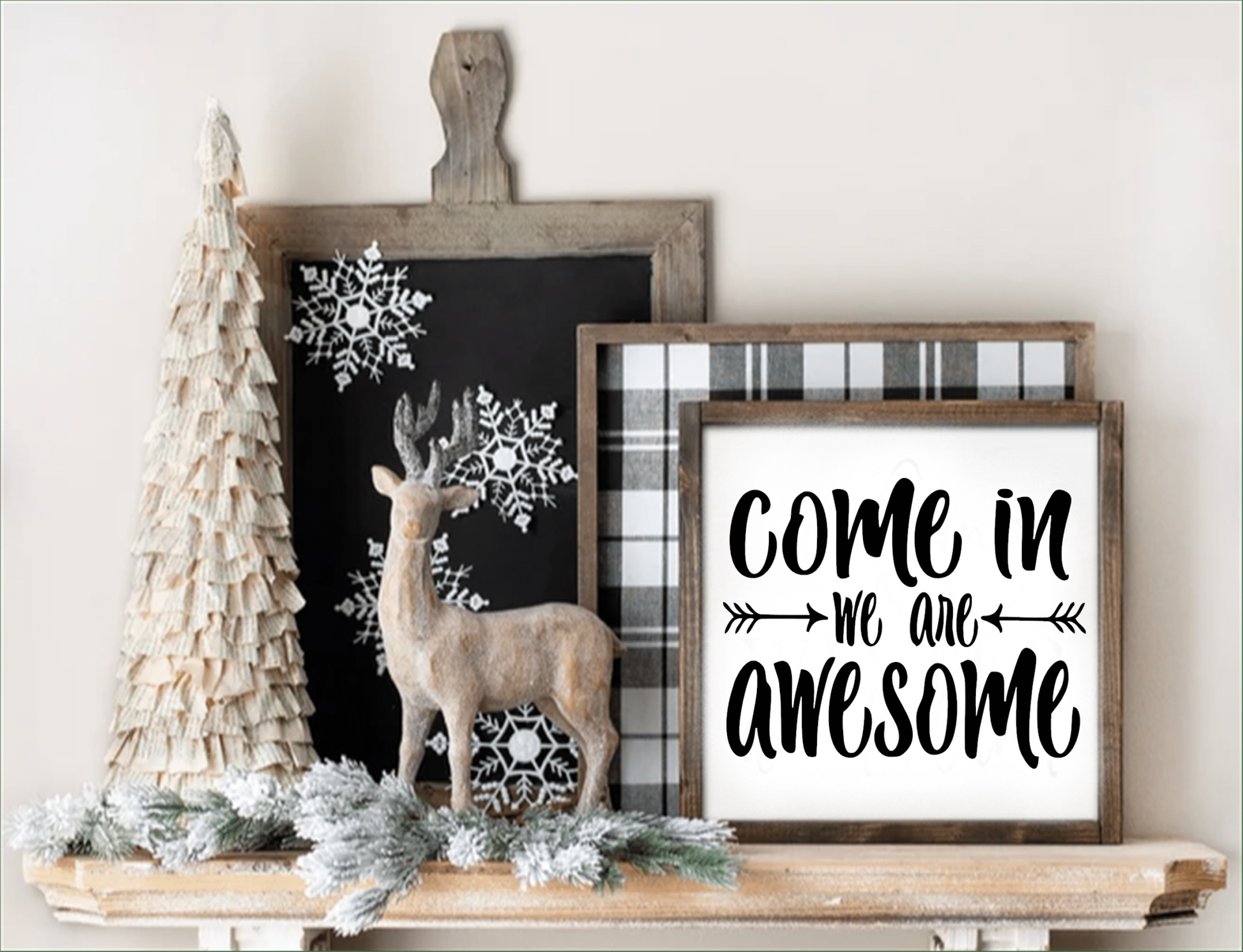 Come in We Are Awesome wood sign with holiday decor, featuring snowflakes and a reindeer.