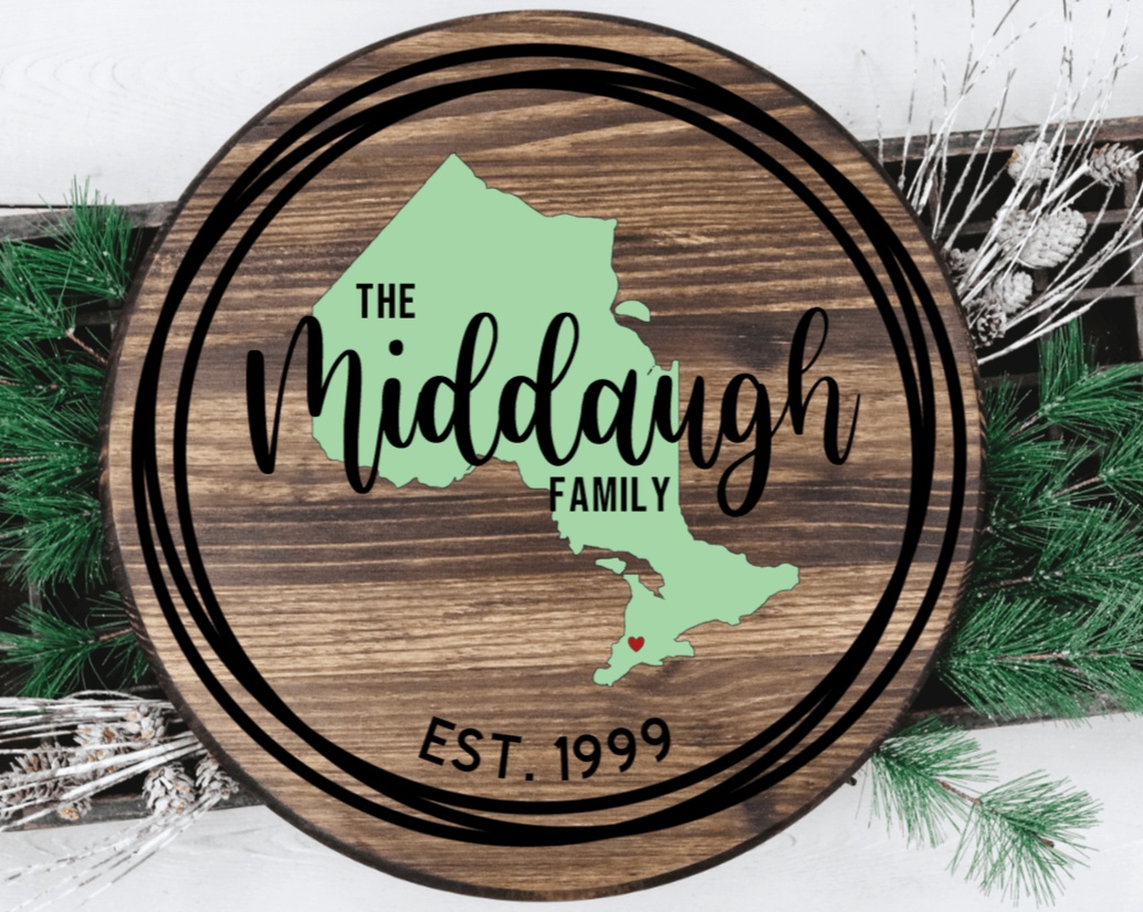 Custom round family wood door sign with personalized text and map design.